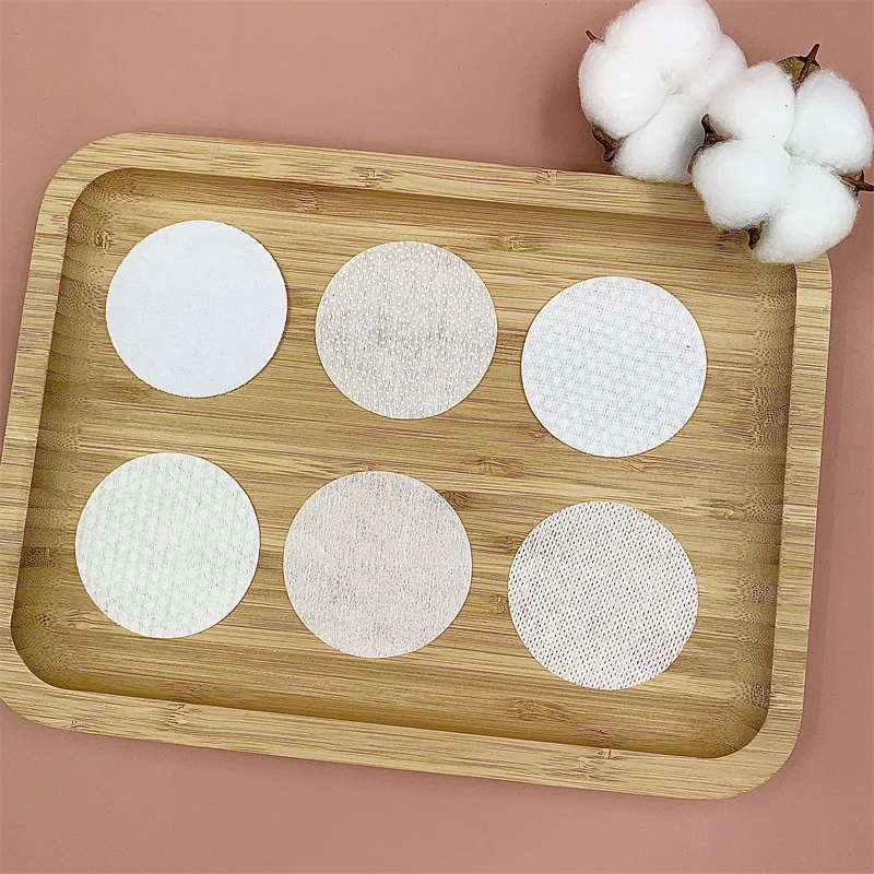 YE29 OEM Factory supply exfoliator embossed dots non woven round cotton pad for nail