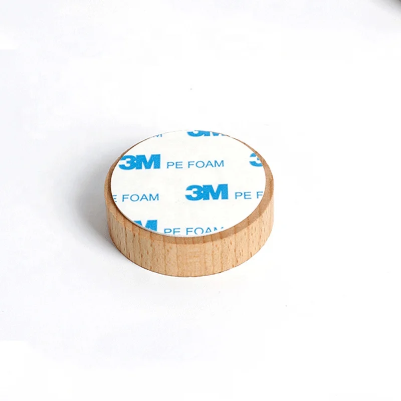 Factory direct sale Nordic solid wood hook behind the door wooden clothes hook living room wall strong sticky hook wholesale.