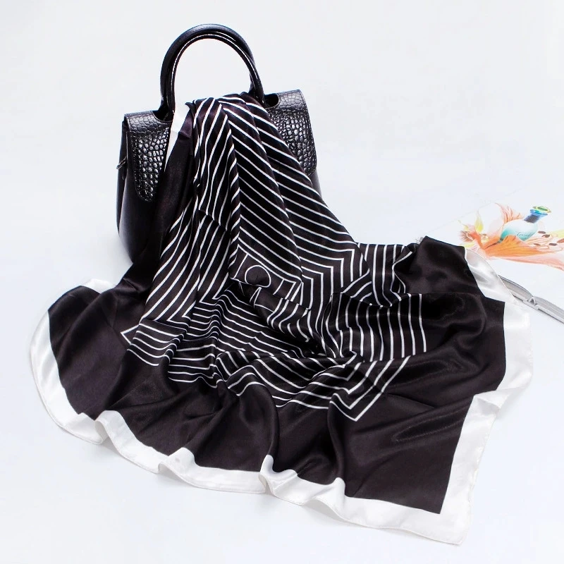 Popular on Amazon stars with the same black and white striped lightweight chain silk scarves  large flat satin scarves