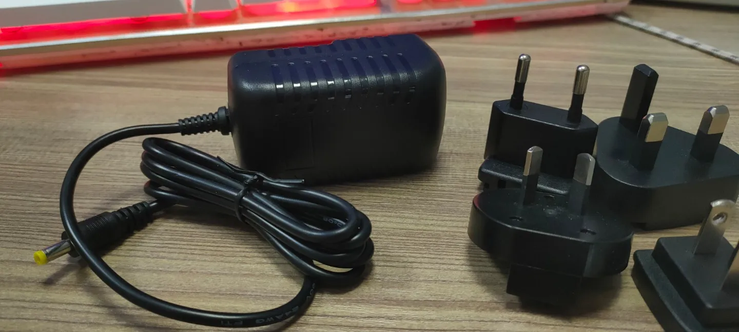 interchangeable plug ac dc adaptor 12v 1a 2a power adapter charger