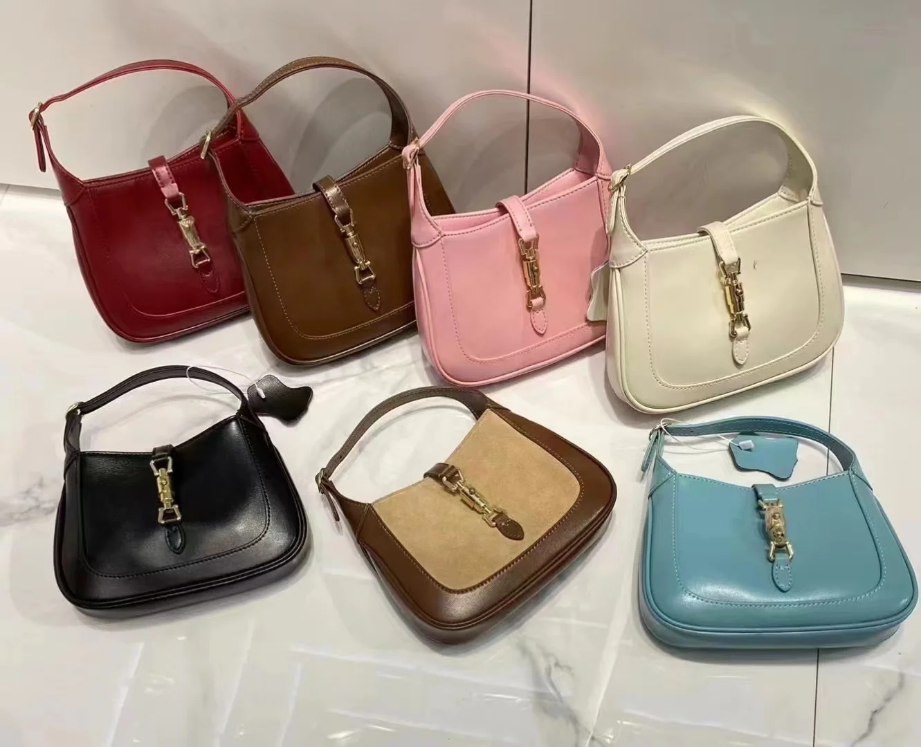 fashion lady genuine leather buckle underarm hobo bags with bullet lock for women elegant hand bag with adjustable length handle