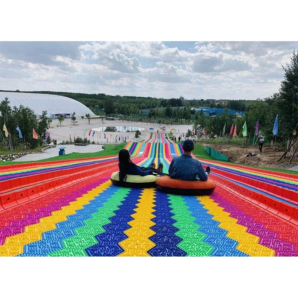 Commercial Rainbow Slide Artificial Ski Grass Turf Surface Donut Slide Ride Dry Slide Slope For Adult