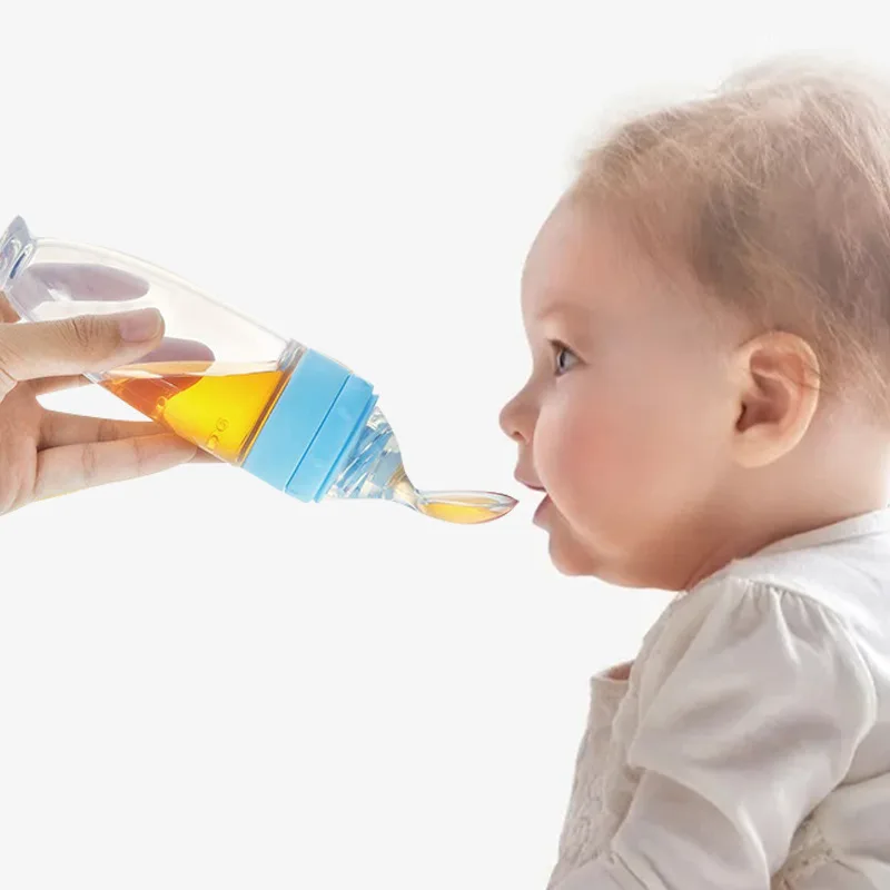 wholesale low price baby squeeze feeding bottle Amazon Hot Sale Silicone Infant Feeder Squeeze Feeding Baby Bottle with Spoon