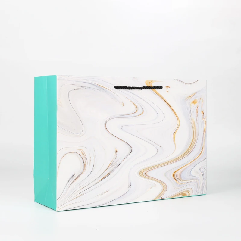 Custom logo gift bag glossy clothes branded retail shopping paper bags with rope handles