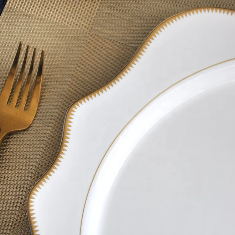 wholesale tooth wedge shaped white and gold rim porcelain ceramic charger dinner plates for wedding decoration