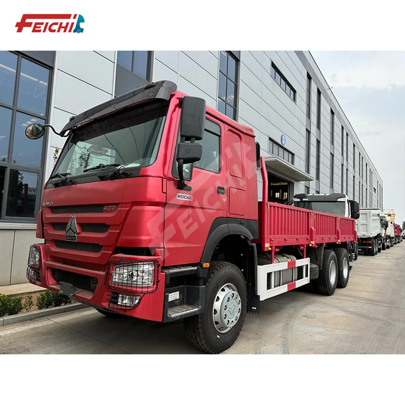 Sinotruk Howo 4x2 6x4 8x4 Dump Truck Red Sinotruk Howo Truck 20 cbm 35 cbm 20 to 50 tonnes Capacity Load Dump Truck for Sale
