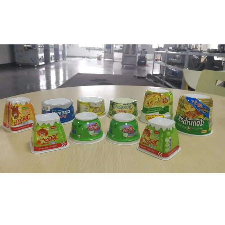 Plastic ice cream yogurt cup shrink sleeve labeling applicator machine