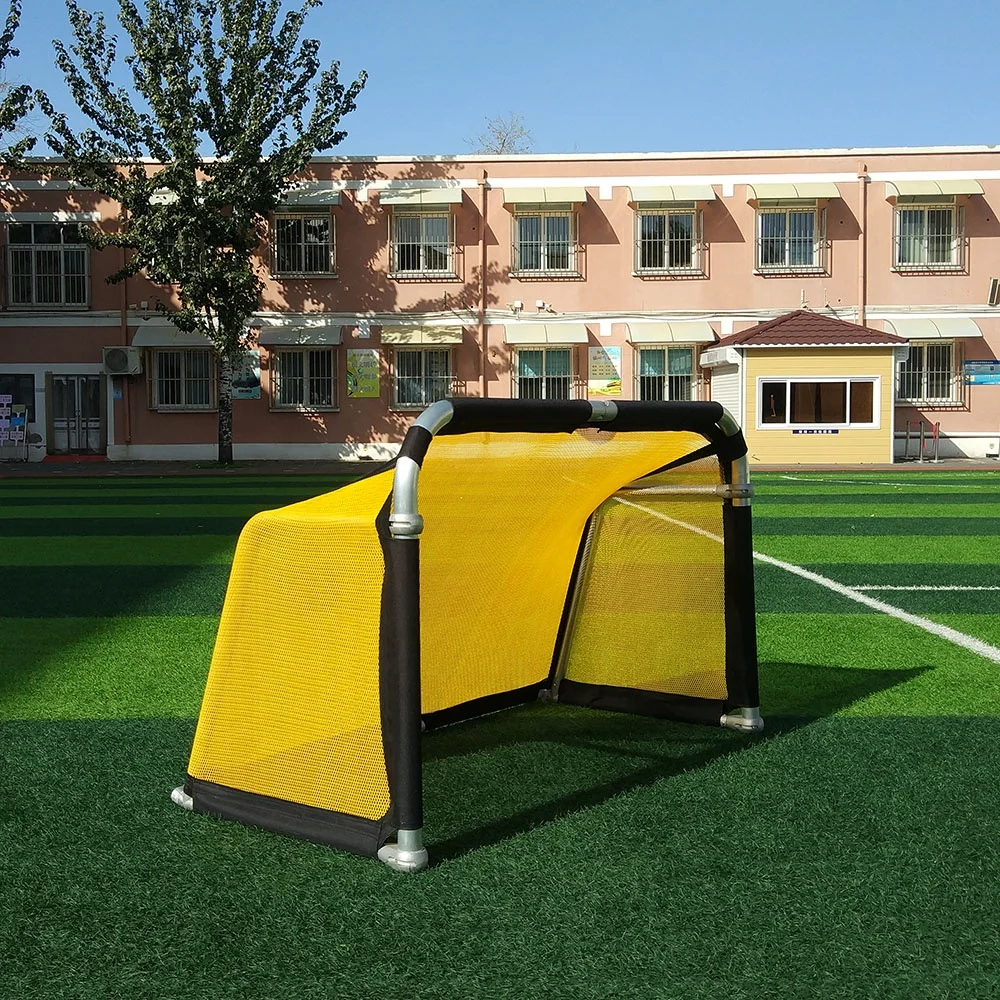 4 ft Kid using foldable  mini aluminum portable soccer goal