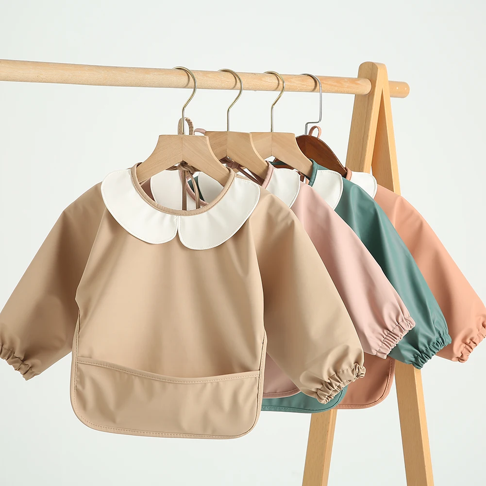 Long Sleeved Bib Children Smocked Clothing Washable Baby Apron OEM Service 100% Polyester Natucare BSCI Hot Selling Baby