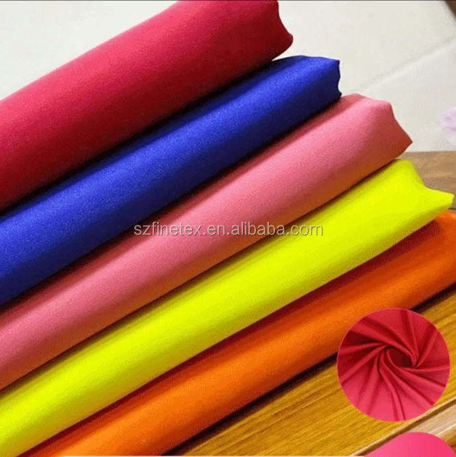 
eco-friendly 100% recycle polyester plain micro fiber peach skin cloth material fabric for beach shorts coat jacket 