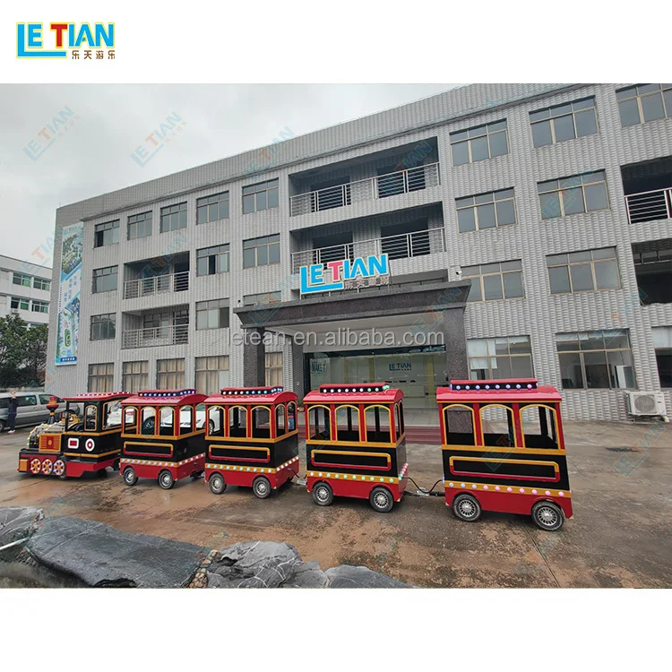 Outdoor public playground backyard kids locomotive train rides commercial shopping mall tourist trackless train
