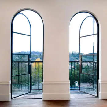 Reliable Quality Custom  Size Design Wrought Iron Arched Glass Door with Decorative Grilles