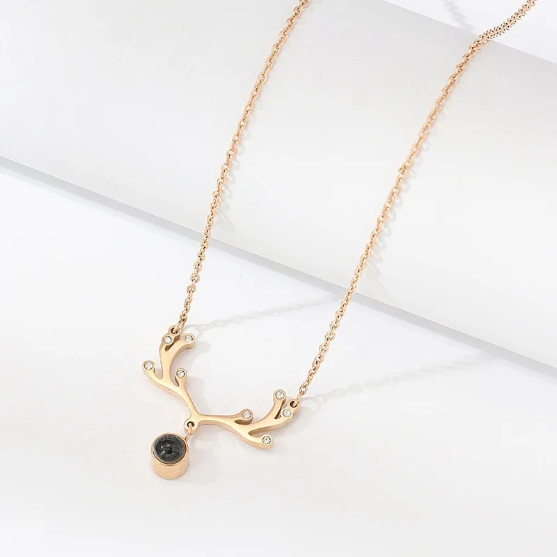 
2021 New One Deer I love You Titanium Steel Necklace Female Rose Gold Smart Deer Love Gift 100 Languages Jewelry 