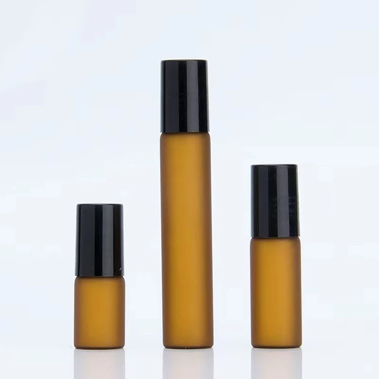 OEM ODM chinese wind 3ml 5ml 10ml essential oil frosted amber white glass ball bottles roller ball lip tube glass roll-on bottle