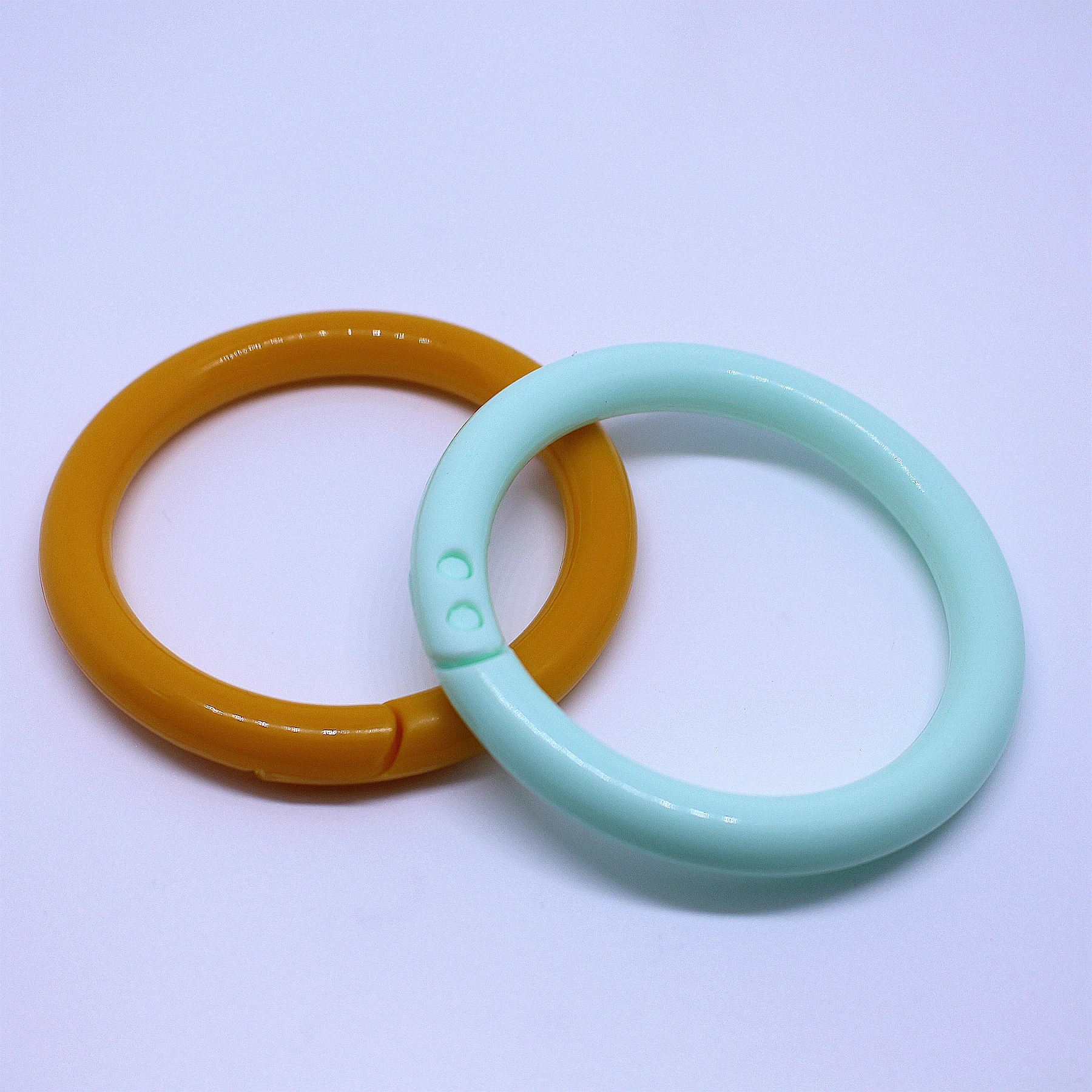 Wholesale kids plastic ring Circular open rubber ring Hanging baby toy custom LOGO plastic ring solid sizer