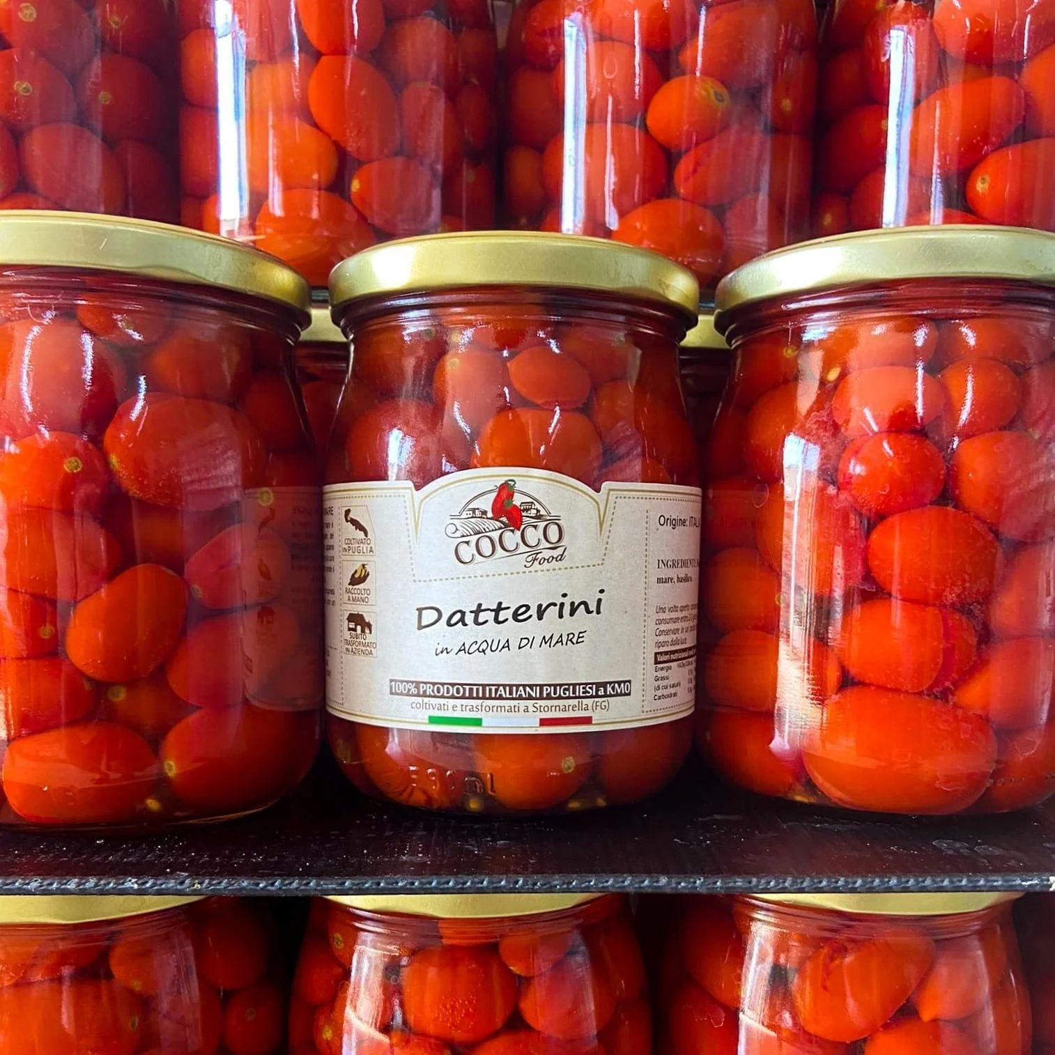 Gourmet Product Mineral Salts And Trace Elements Whole Red Cherry Datterino Tomatoes In Sea Water For Luxury Restaurant