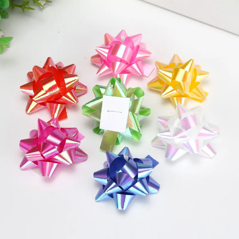 Разноцветные ленты с бантом в виде звезд для подарочной упаковки
