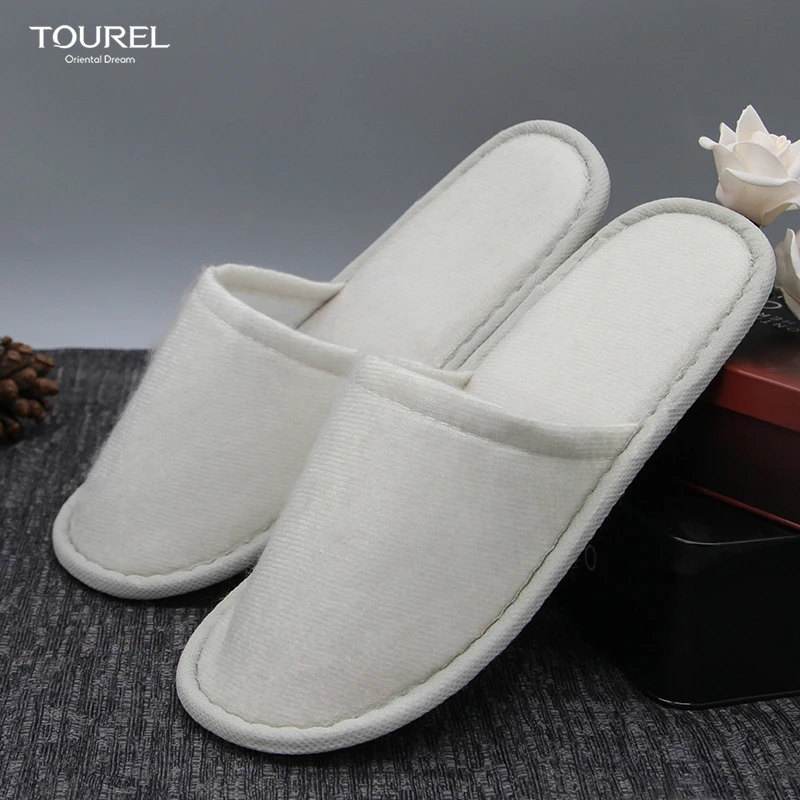 OEM Custom Logo luxury hotel room amenities slippers manufacturer modern design plain nap cloth shoes disposable spa slippers