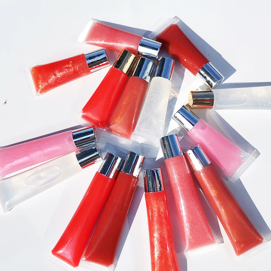 
Squeeze tube Plimping lipgloss custom low MOQ mint candy strawberry flavor lip gloss private label 