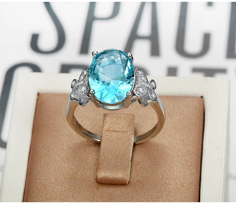2022 Hot new products sea blue sapphire CZ finger twist infinity ring designs engagement ring or couple ring for woman