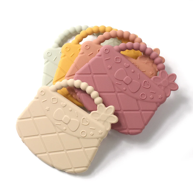 Free Sample Wholesale BPA Free food grade Handbag Funny Teething Toys Soft Silicone Baby Teether Toy