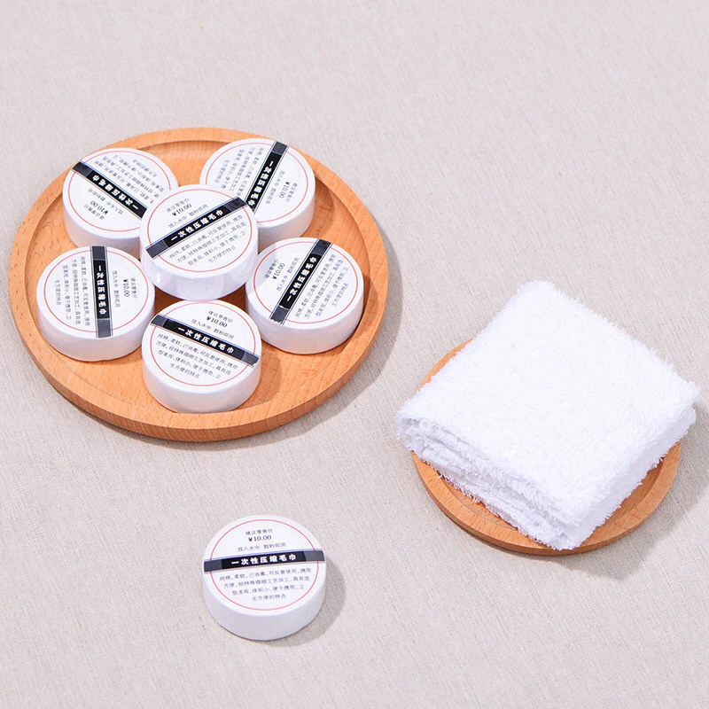 Wholesale Chinese factory compressed disposable hotel travel small towel