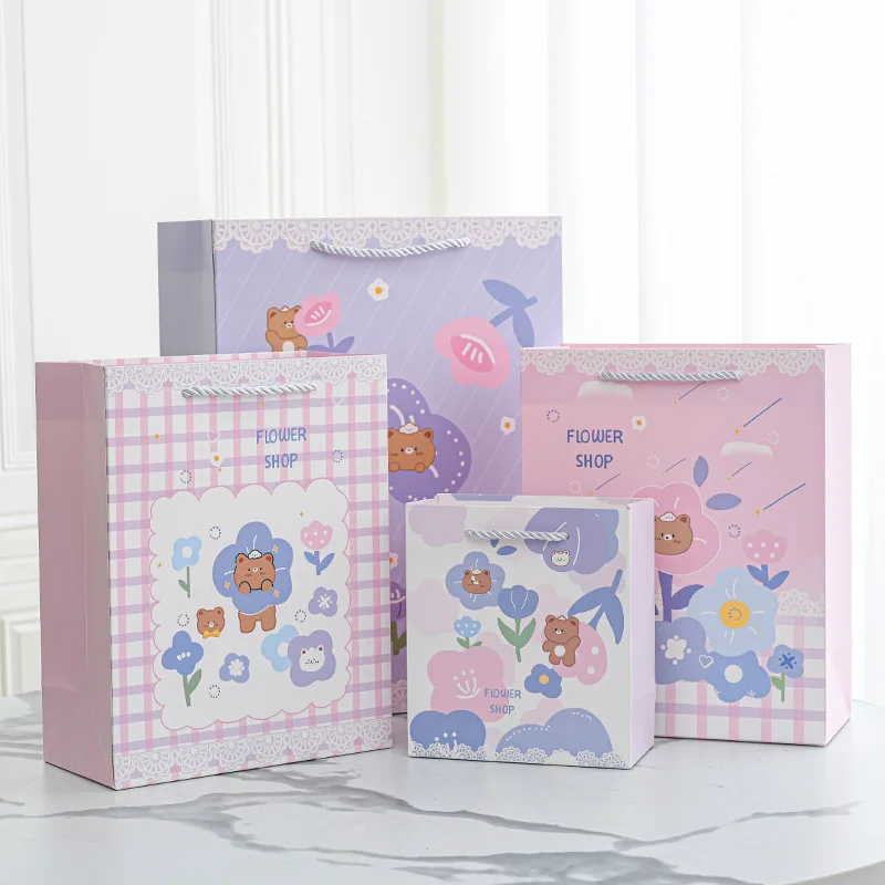 Customized cute bear pattern eco-friendly color printed paper bag UV embossed logo paper bag with handle shopping paper bag
