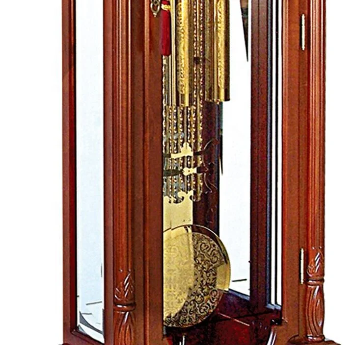 Polished-brass pendulum mirrors the dial polished brass weight shells with decorative bands Grandfather Clock