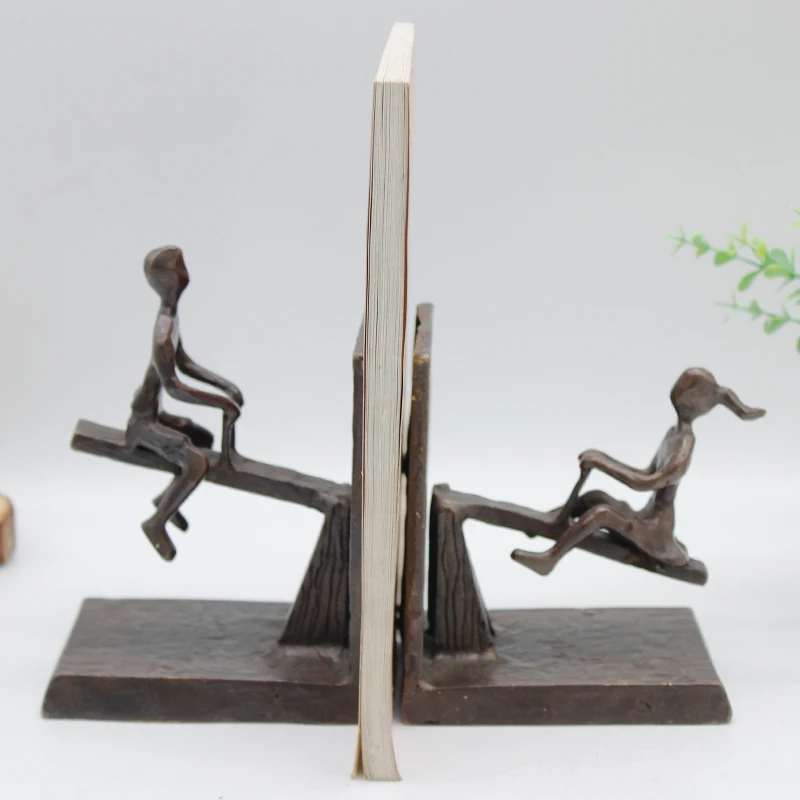 Cast iron sculpture children playing with seesaw bookends figurine For Decor
