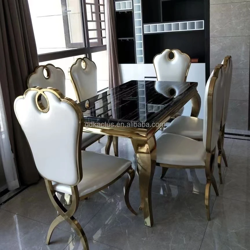 Golden color marble top stainless steel frame dining table with 8pcs chairs