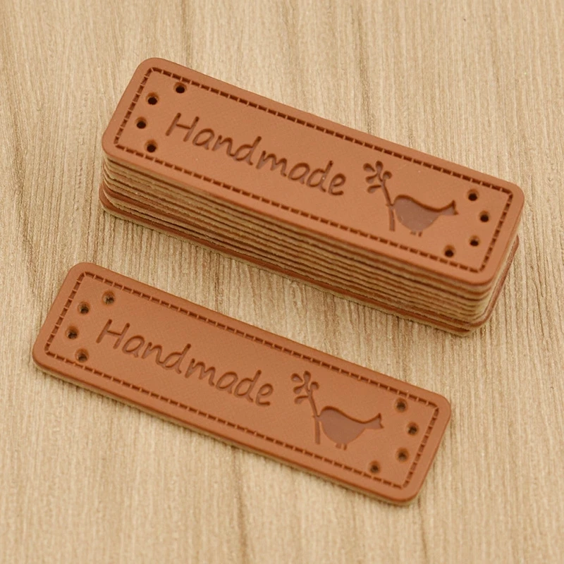 Wholesale High Quality Garment Pu Leather Embossed Labels Hand Made Tags For Clothes Hat Bags