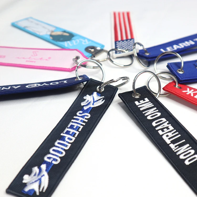 Polyester fabric edge wrapped keychain embroidered letter logo woven belt keychain minimalist gift pendant