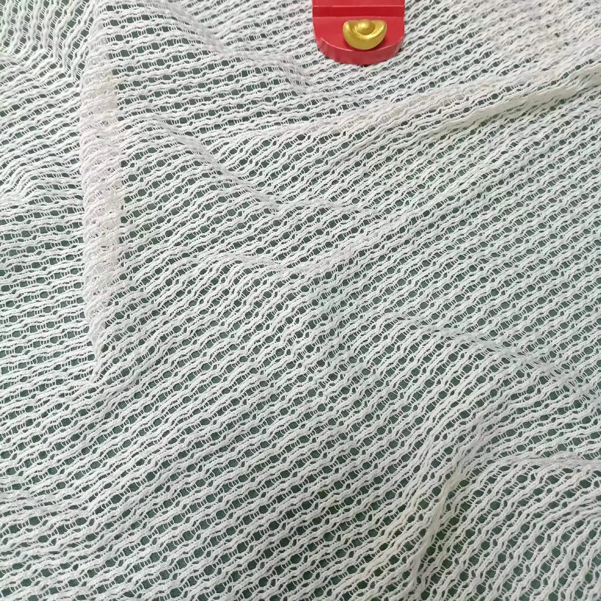 wave pattern crochet knitted fabric 3D jacquard swimwear fabric hollow breathable polyester fabrics for clothing women