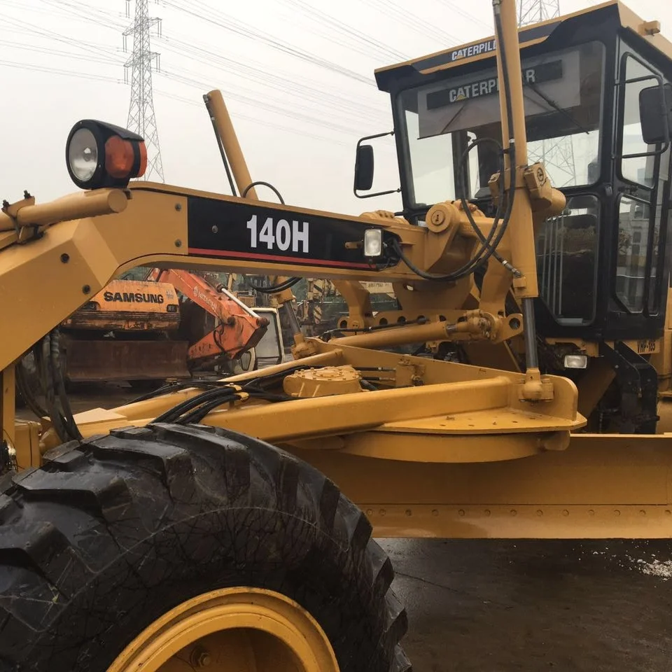 Автогрейдер Caterpillar140H сделано в