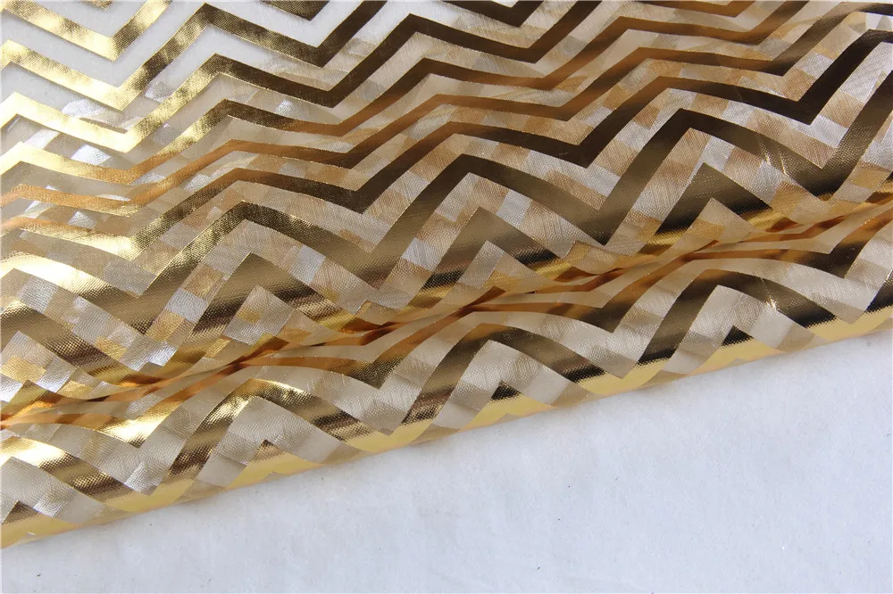 
Nylon organza table runner with bronzed design 