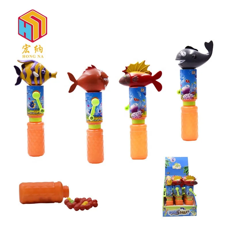 marine organism plastic hand shake syringe  water gun toy kids with sweet candy
