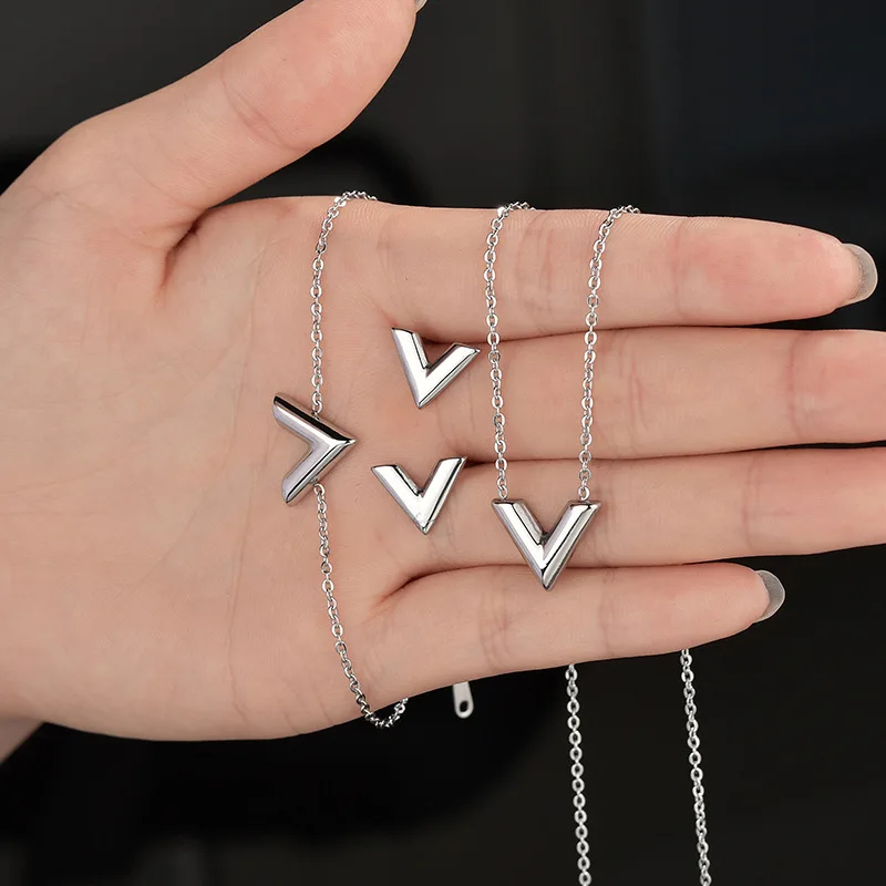 Europe & United States New Titanium Steel V-shaped Three-dimensional Letter Fashion Necklace Bracelet Earrings Jewelry Sets