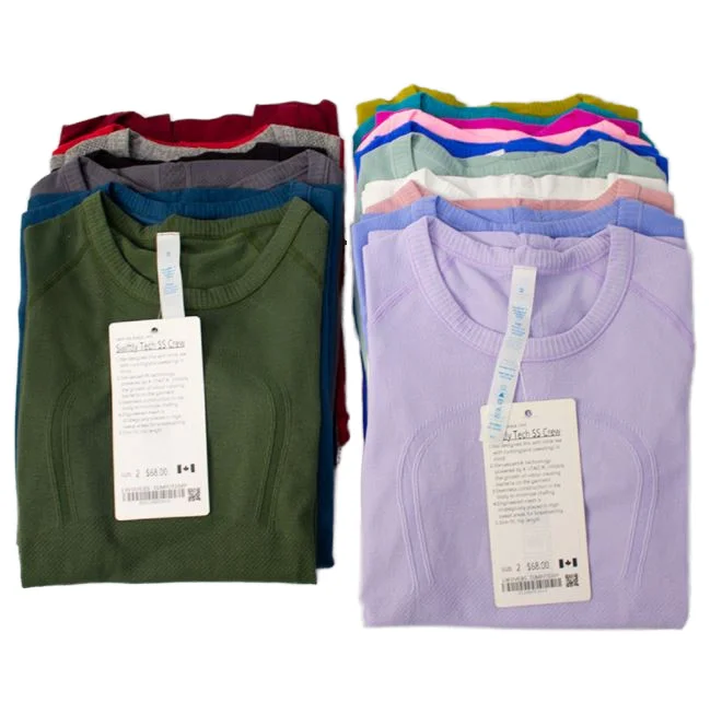 Wholesale High elastic seamless tight women sports t-shirt moisture core knitted high elastic fitness yoga top women