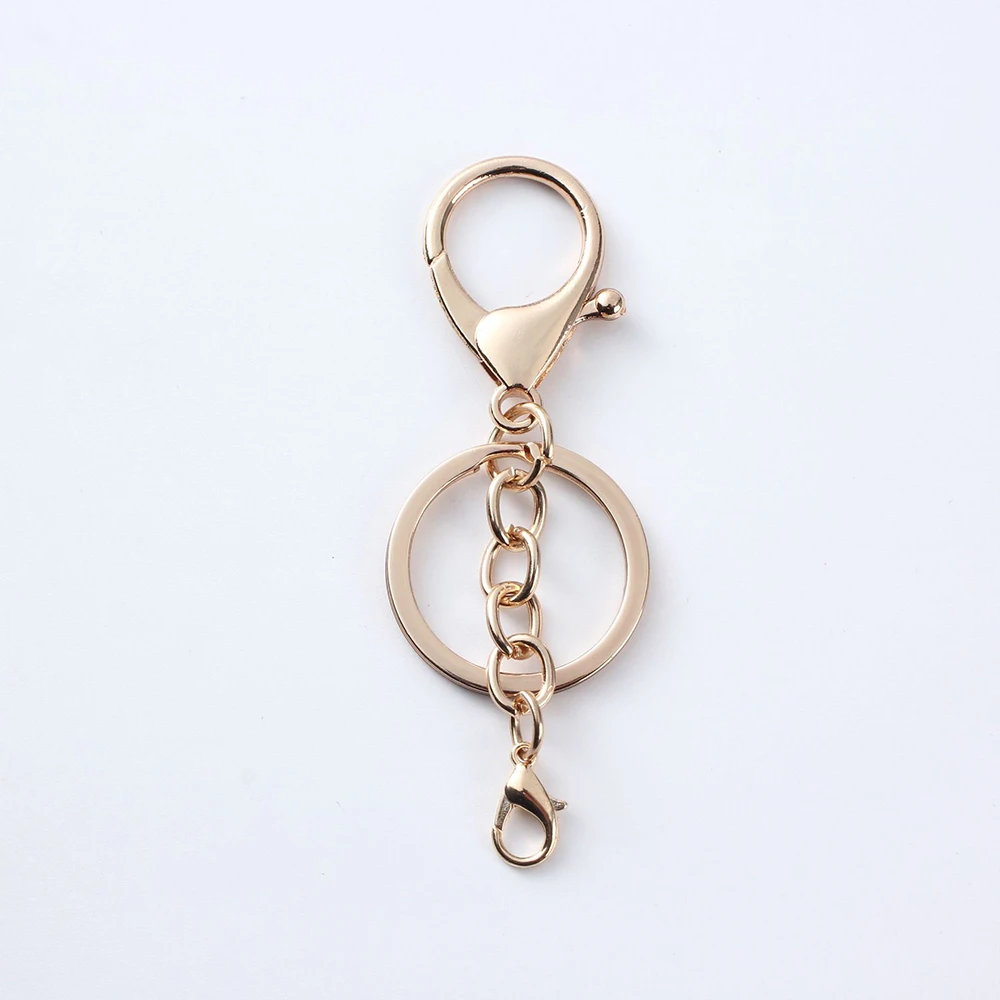 2024 Trending Gold Lobster Clasp Fashion Toy Doll Keychain Metal Keychains With Ring