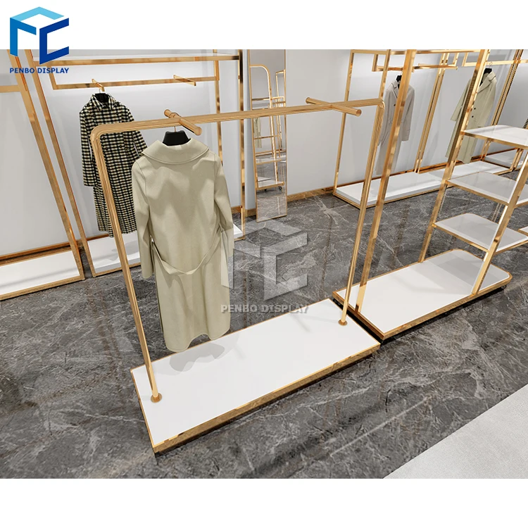 Gold clothing rack apparel retail nesting table clothes shelving garment display rack clothing store furniture