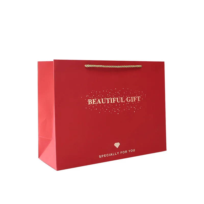 Customized red spot beautiful gift paper bag hot stamping craft gift bag with handle simple clothing store shopping bag