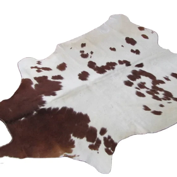 dining room furniture equipped with cowhide patchwork carpet and rug