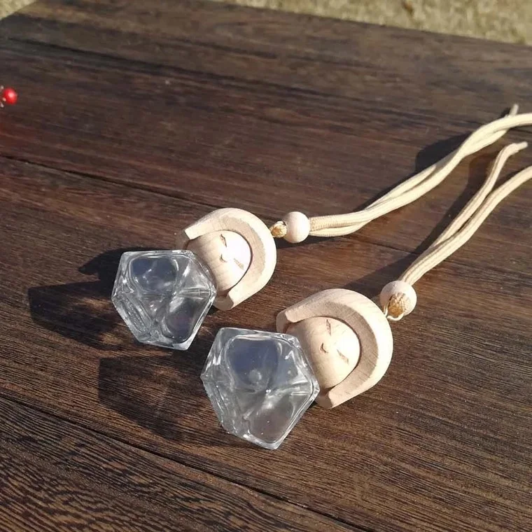 Factory wholesale high end cleardoll shaped empty car air freshener perfume glass bottle with wooden top