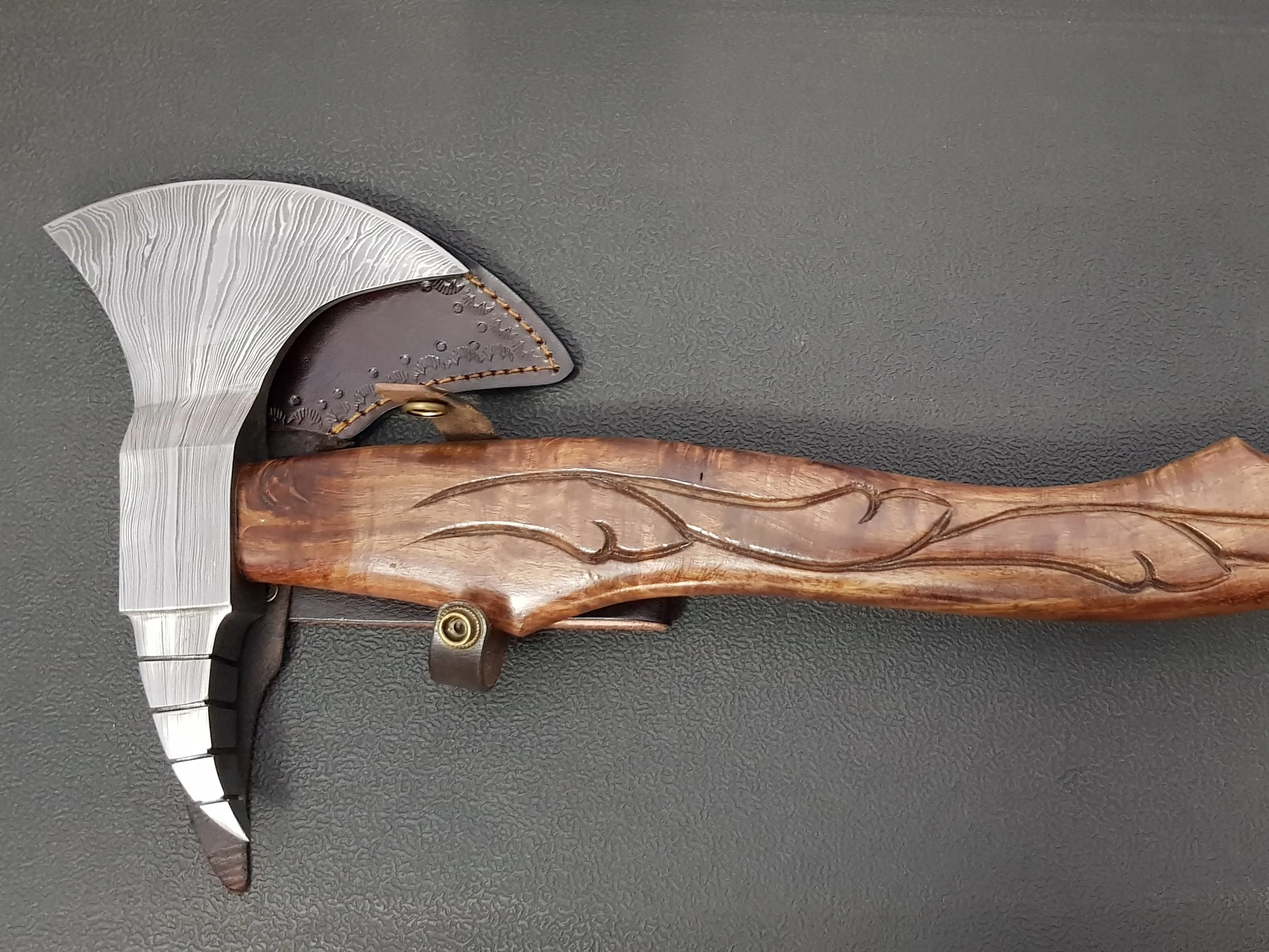 Damascus steel axe with rose wood engraved handle