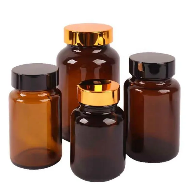 Shandong high quality capsule silicon 60 ml 100 ml medicine screw on lid pharmaceutical glass bottles