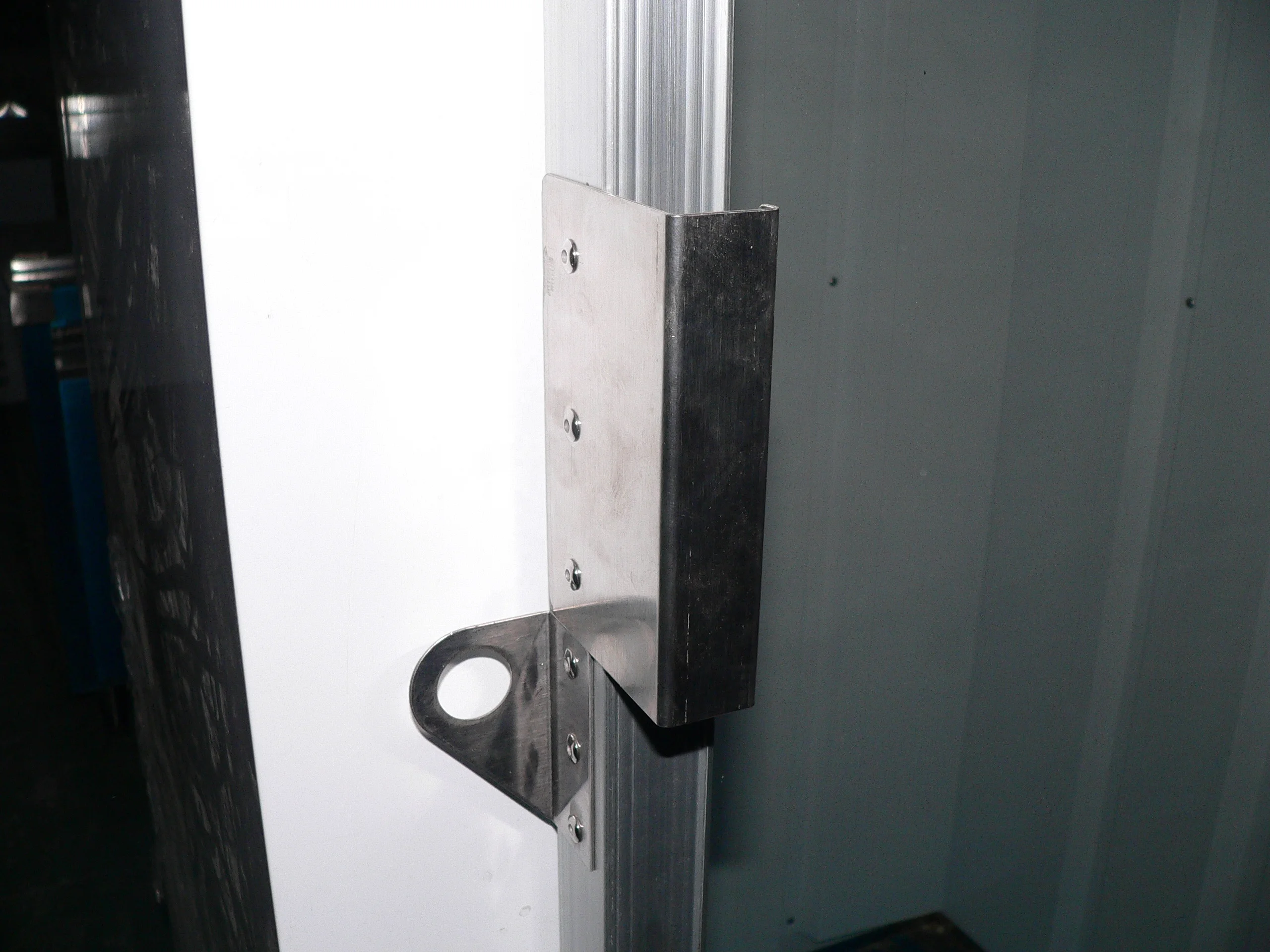 Door handle and locking pin for bagged ice storage