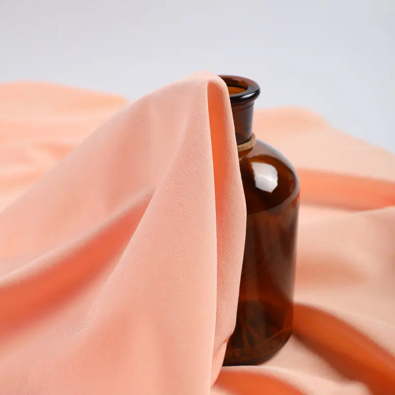 Shaoxing yuyuan imp 100 polyester non spandex chemical fabrics roll woven cloth garment machienical stretch nslycra fabric