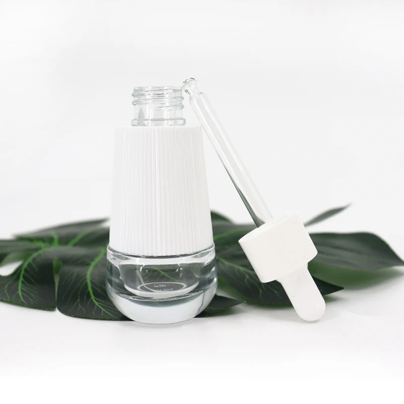 Wholesale 30ml Cosmetics Packing Taper Essential Oil Clear Glass Dropper Bottle With Plastic Outer Cover For Face Essence Serum