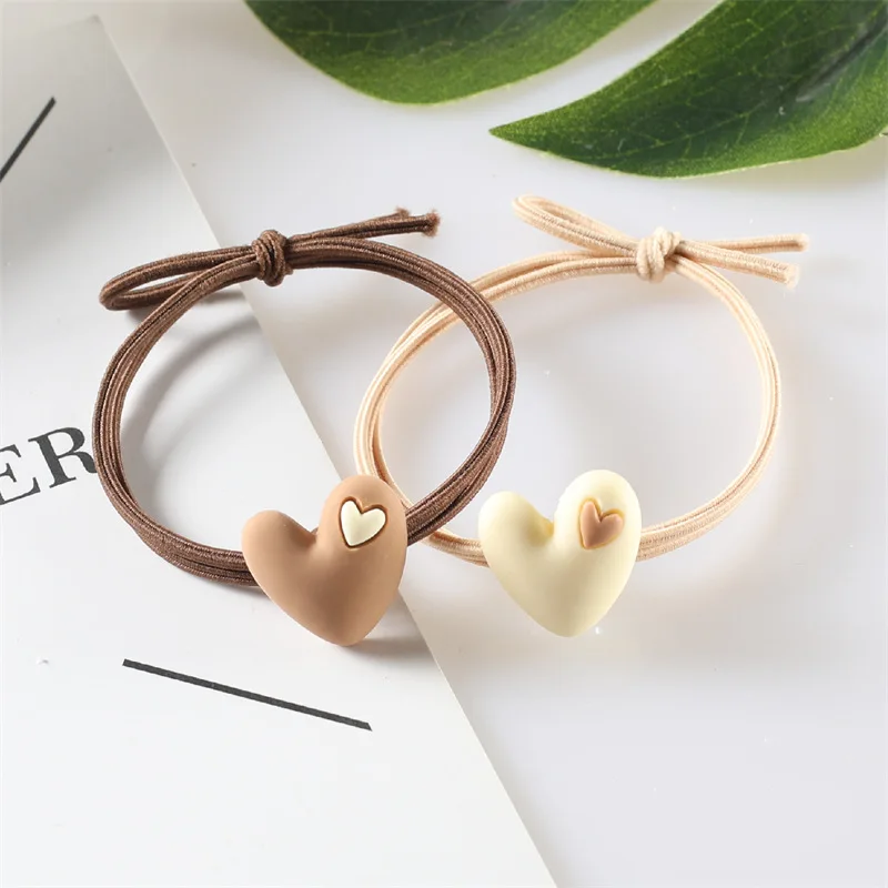Korean version of popular peach heart milk tea color tie hair adult student hair circle heart-shaped elastic band