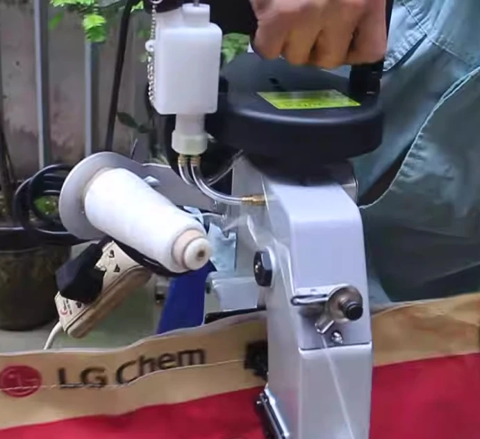 Handheld sewing machine